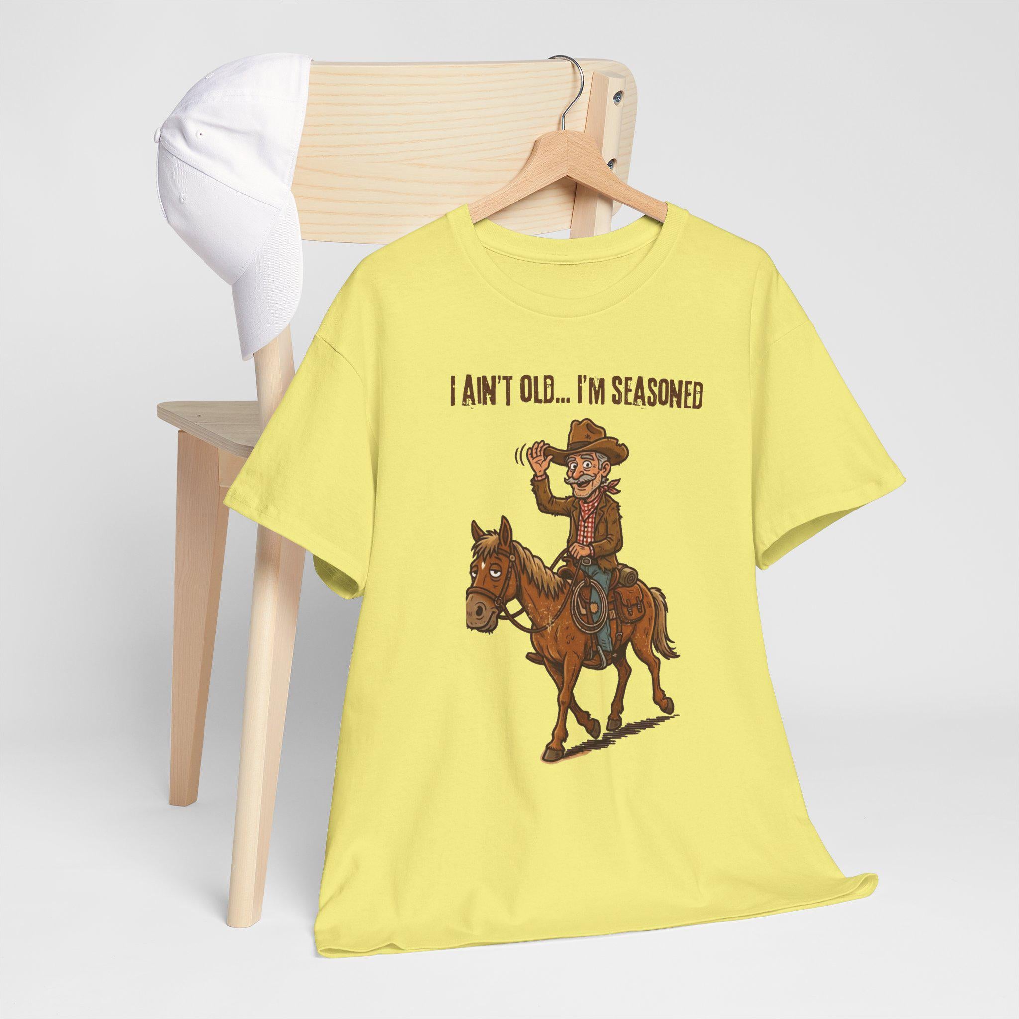 I Ain't Old I'm Seasoned Cowboy on Horse T-Shirt | Western Humor, Rodeo Graphic